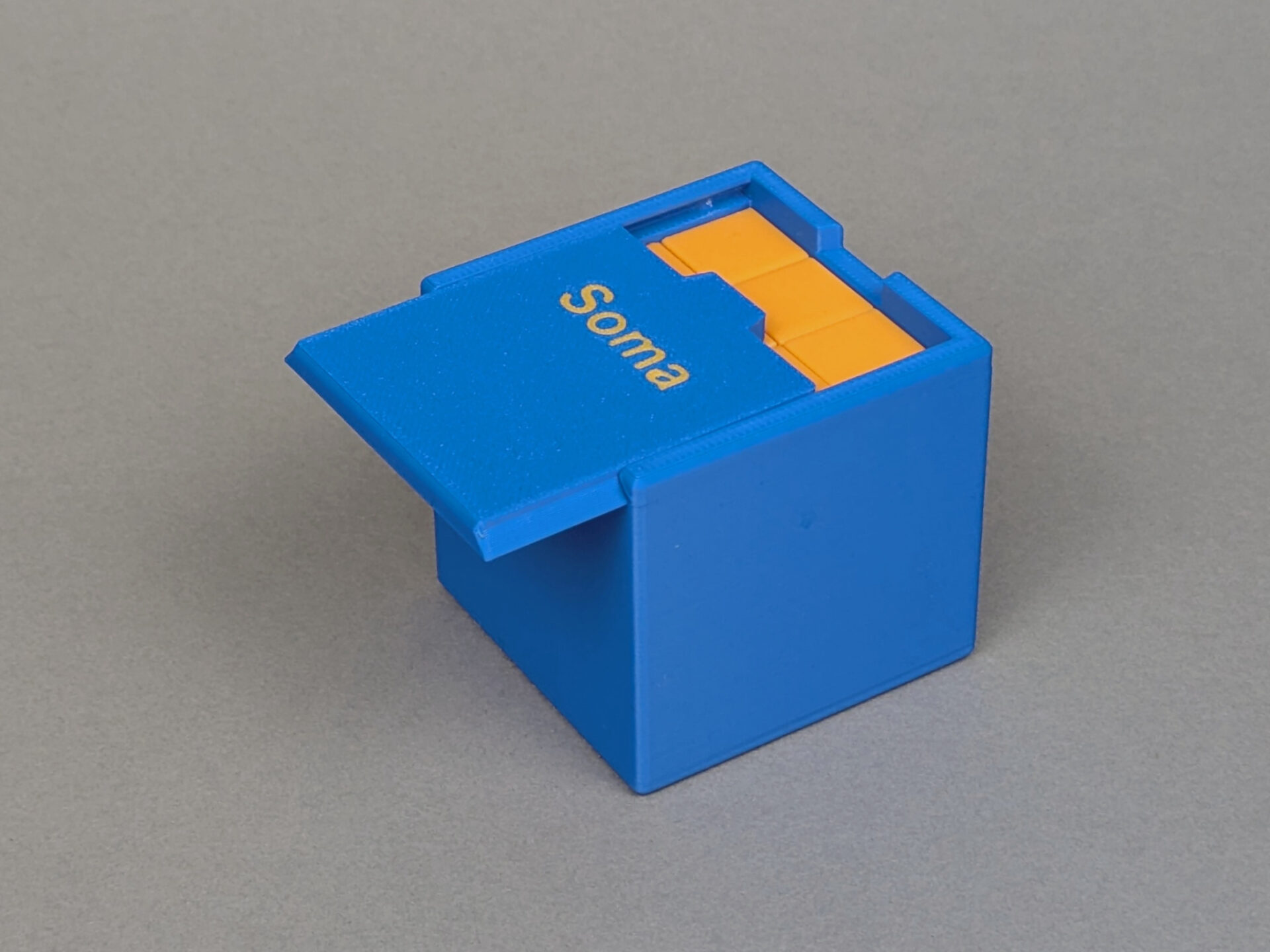 3D-printed Soma puzzle pieces