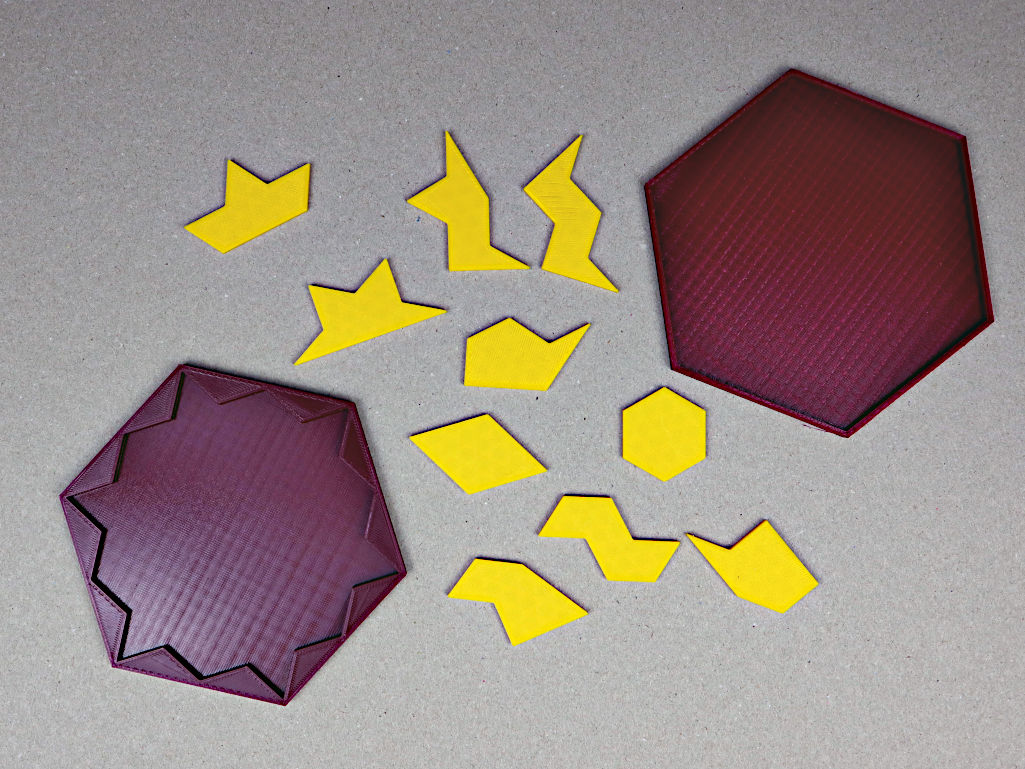 Hexapons-Puzzleteile mit Box