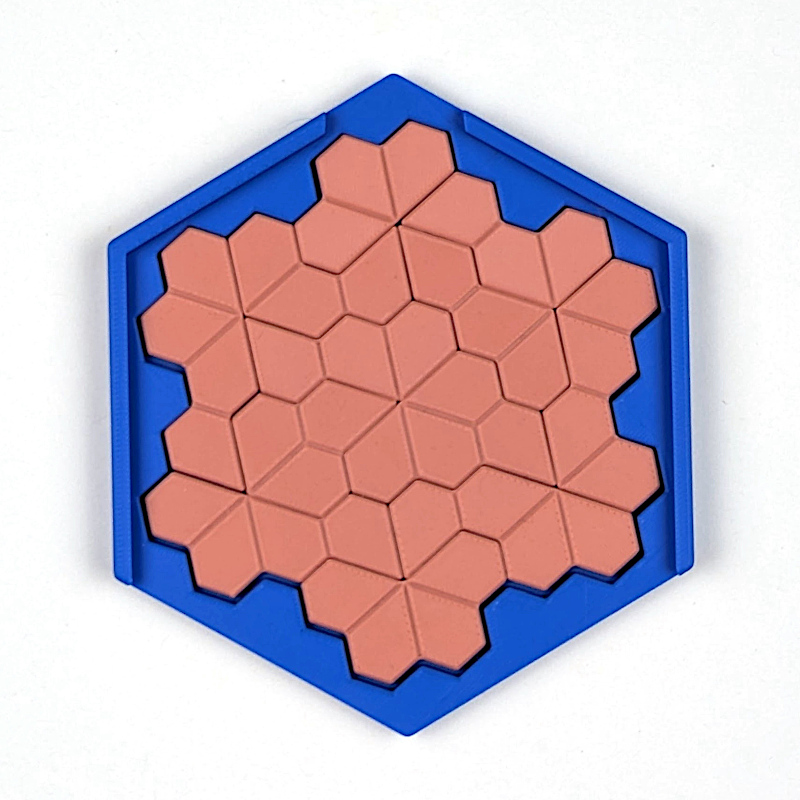 Floret-Puzzle in einer blauen sechseckigen Box